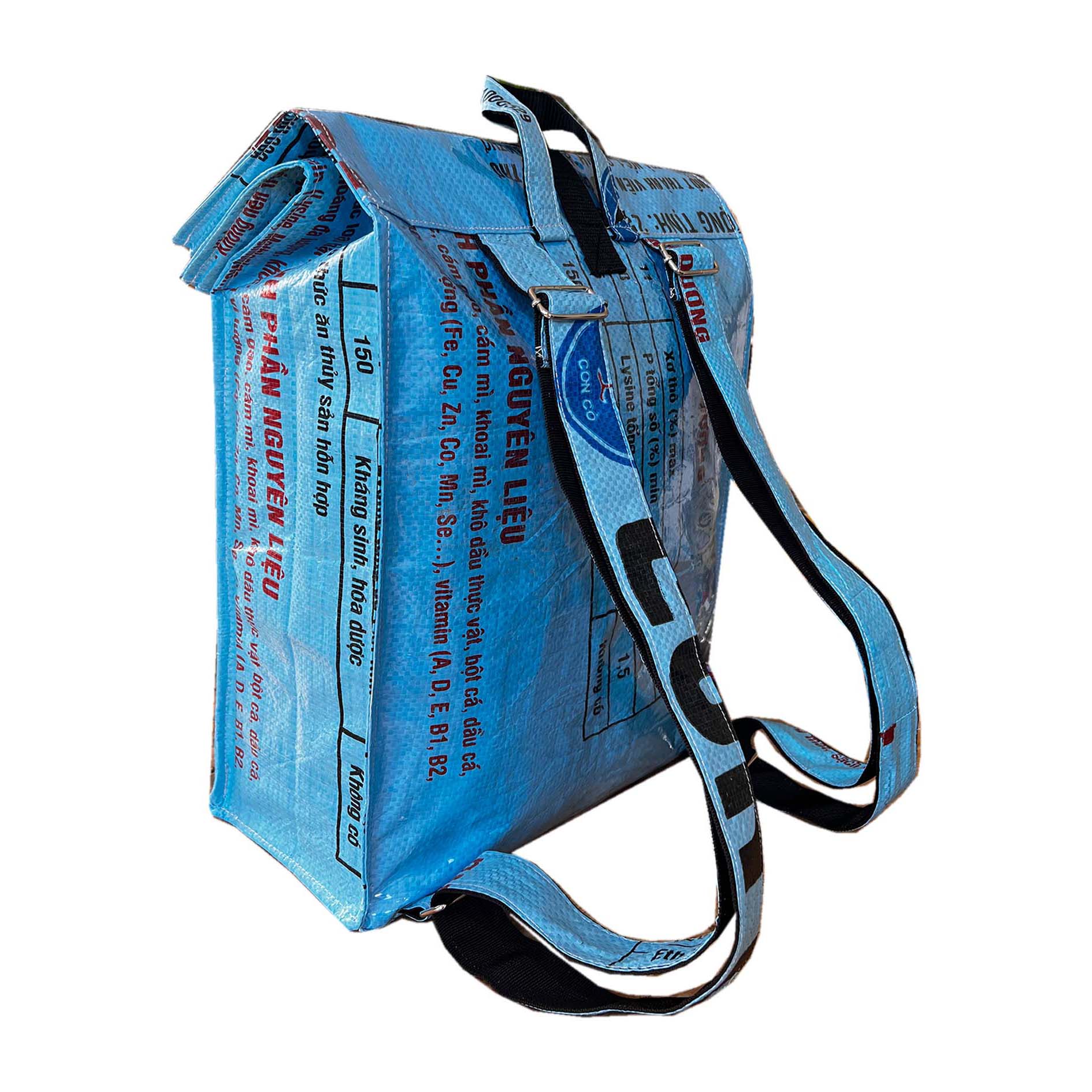 recycled material roll-top backpack with fish print.Animal print bag. Ethically made sustainable rucksack by UppyBags Edit alt text