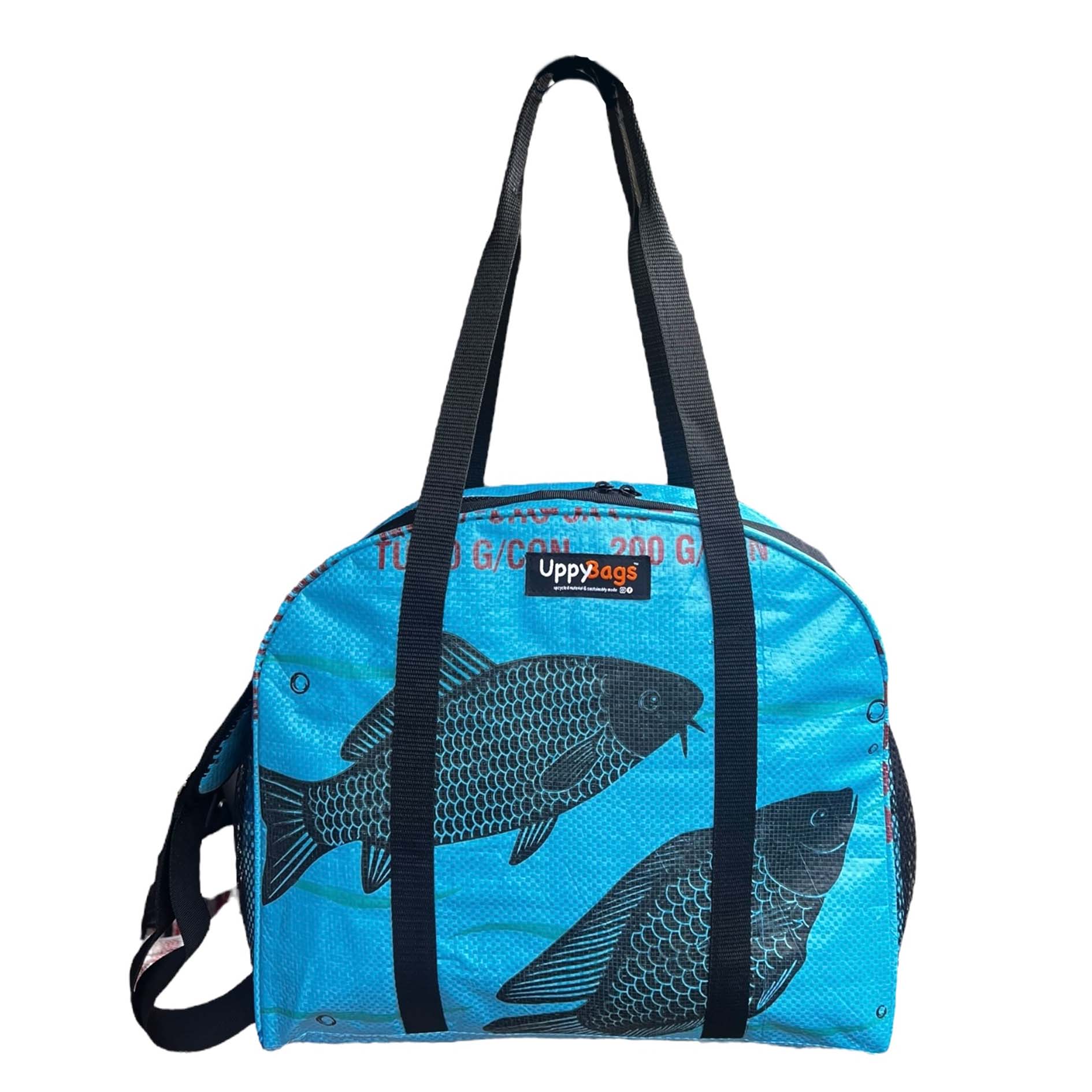 Blue bag with fish design and Uppabags logo on a white background