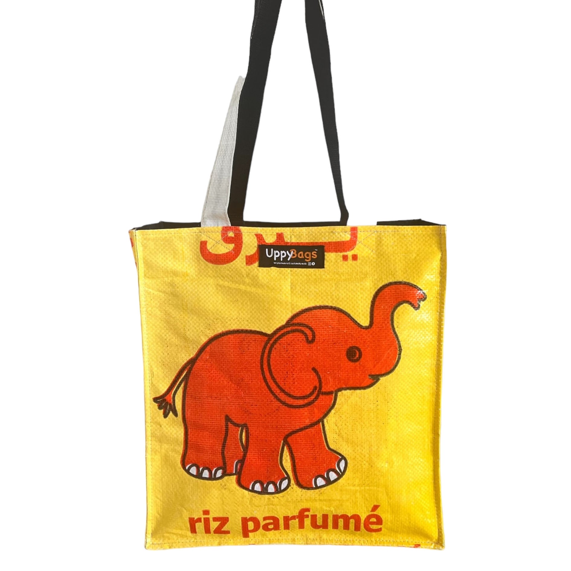 Recycled material shoulder bag with zip and animal print