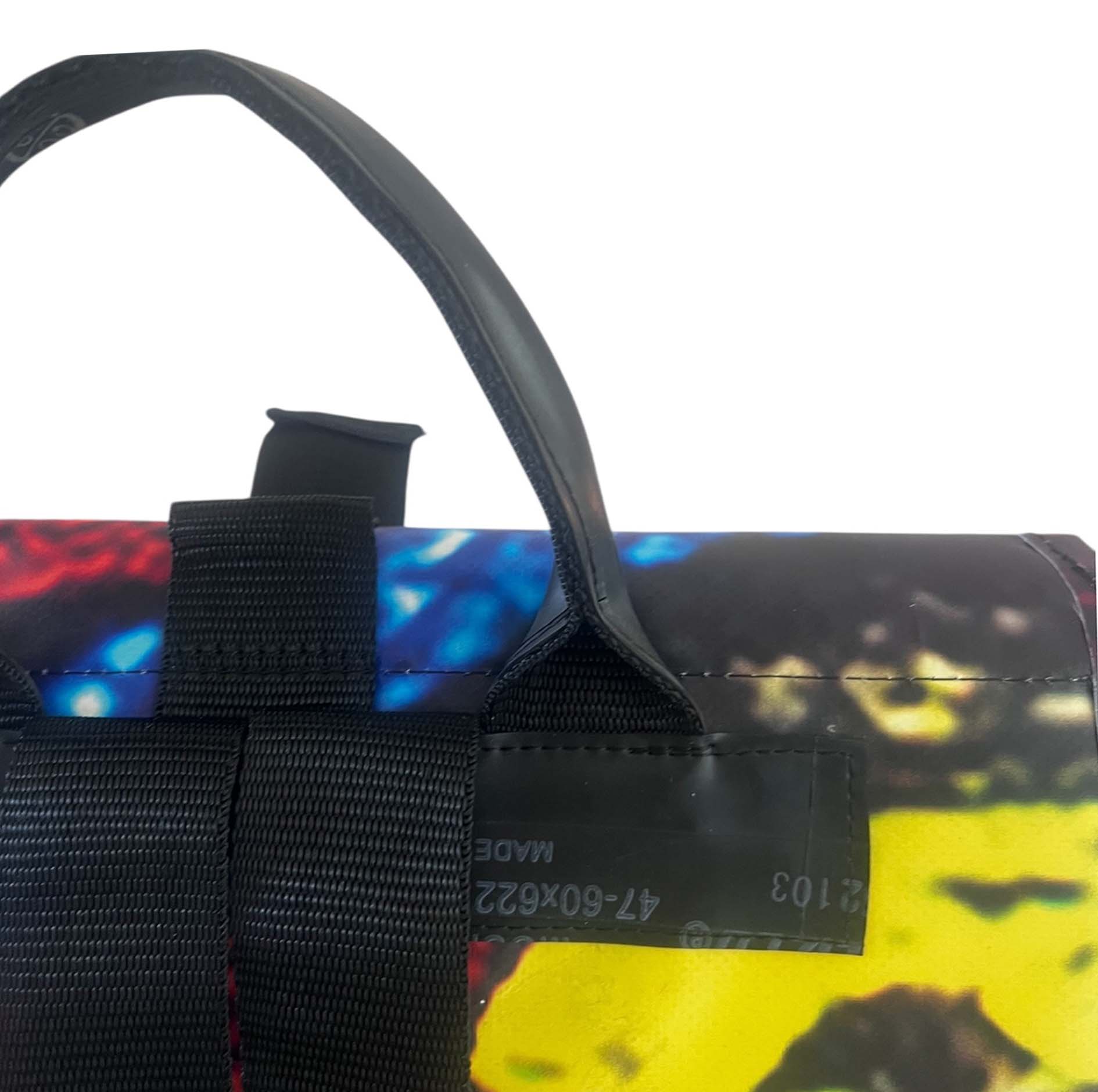 Close-up of a colorful bag with a strap