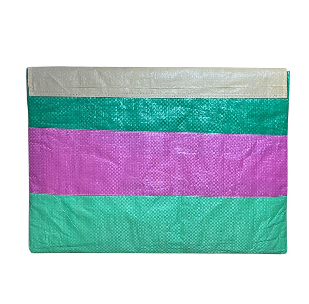 Colorful striped bag with green, purple, and beige sections on a white background