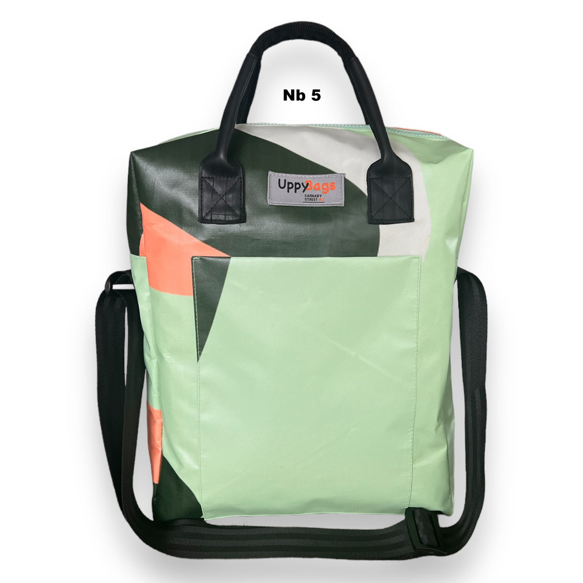 a green Carnaby handbag with a geometric pattern featuring orange and white colors.
