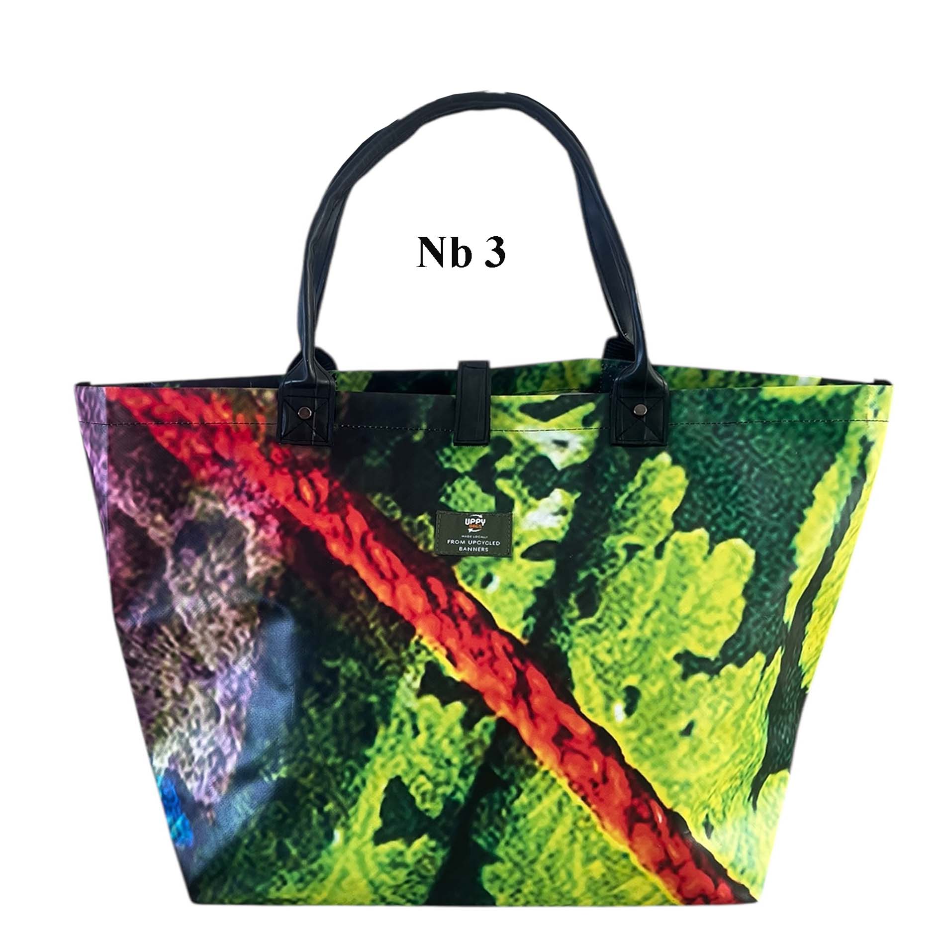 Colorful tote bag with abstract design on a white background