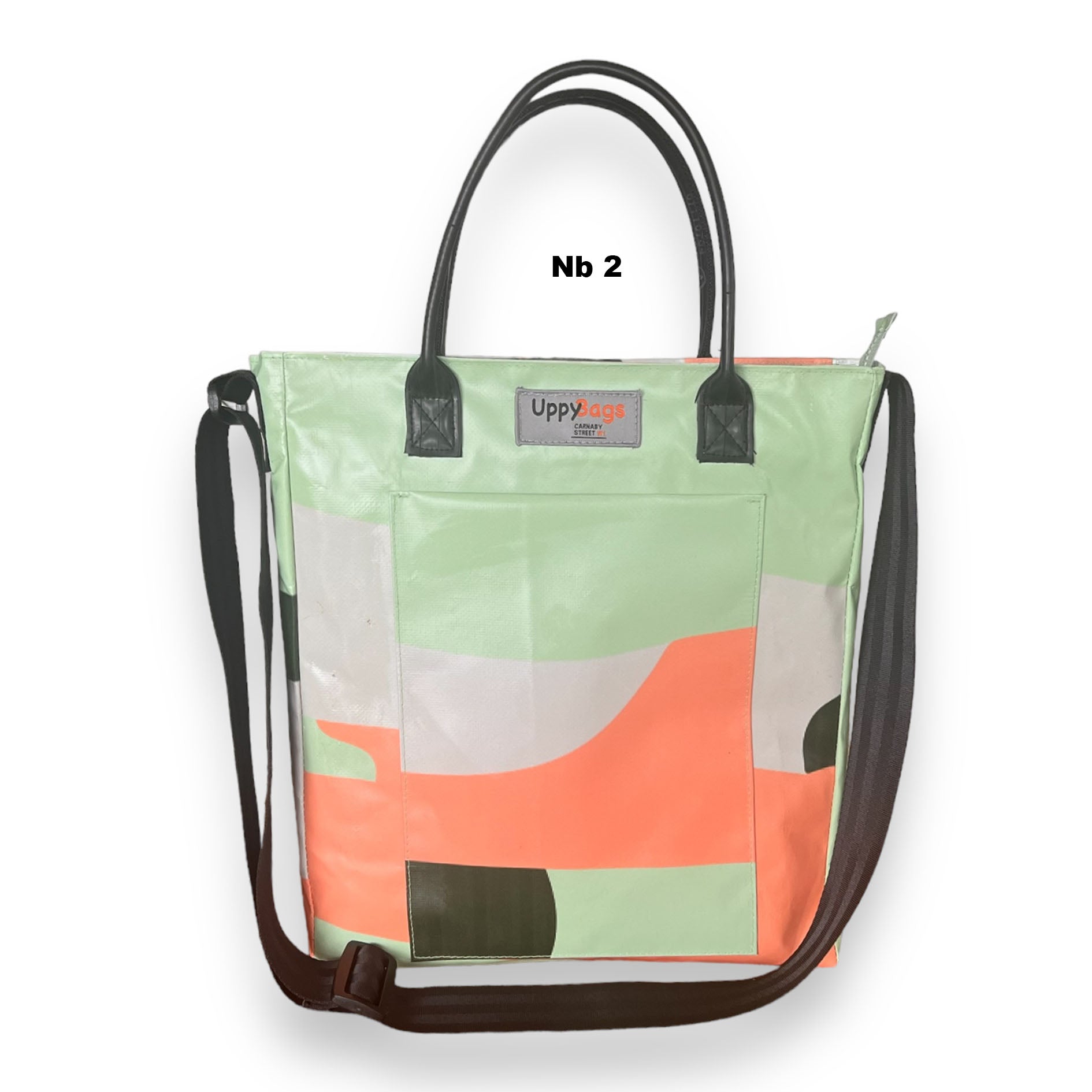 Recycled material bag made of upcycled scaffold banner