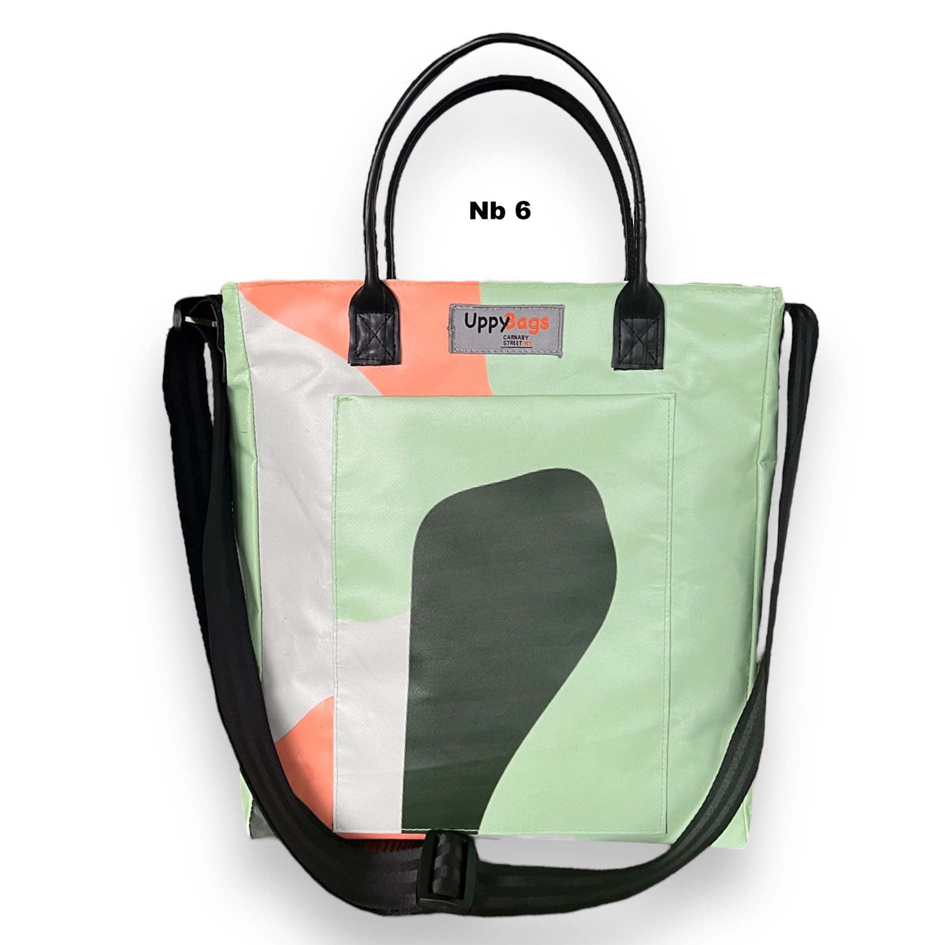 Recycled material bag made of upcycled scaffold banner