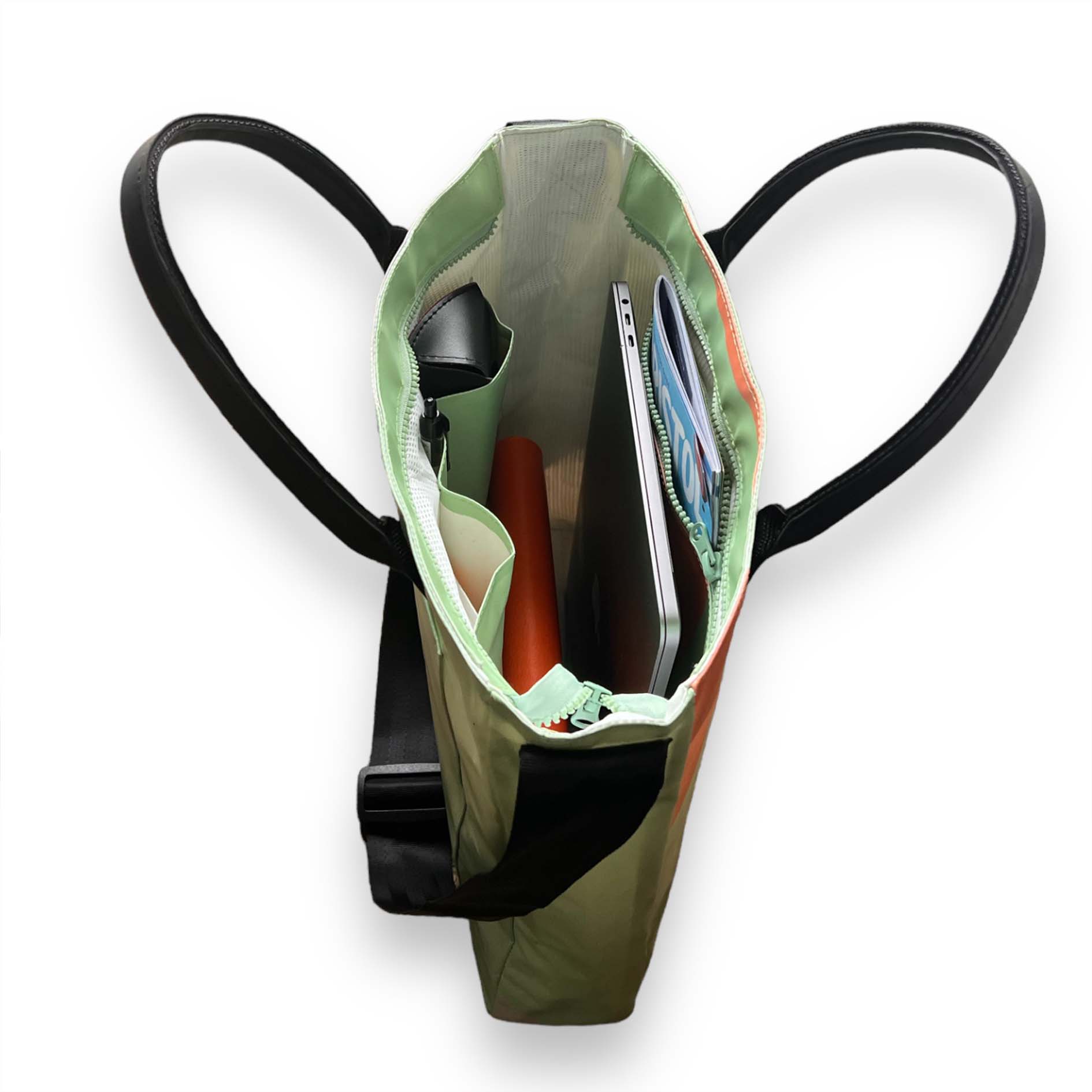 Recycled material bag made of upcycled scaffold banner