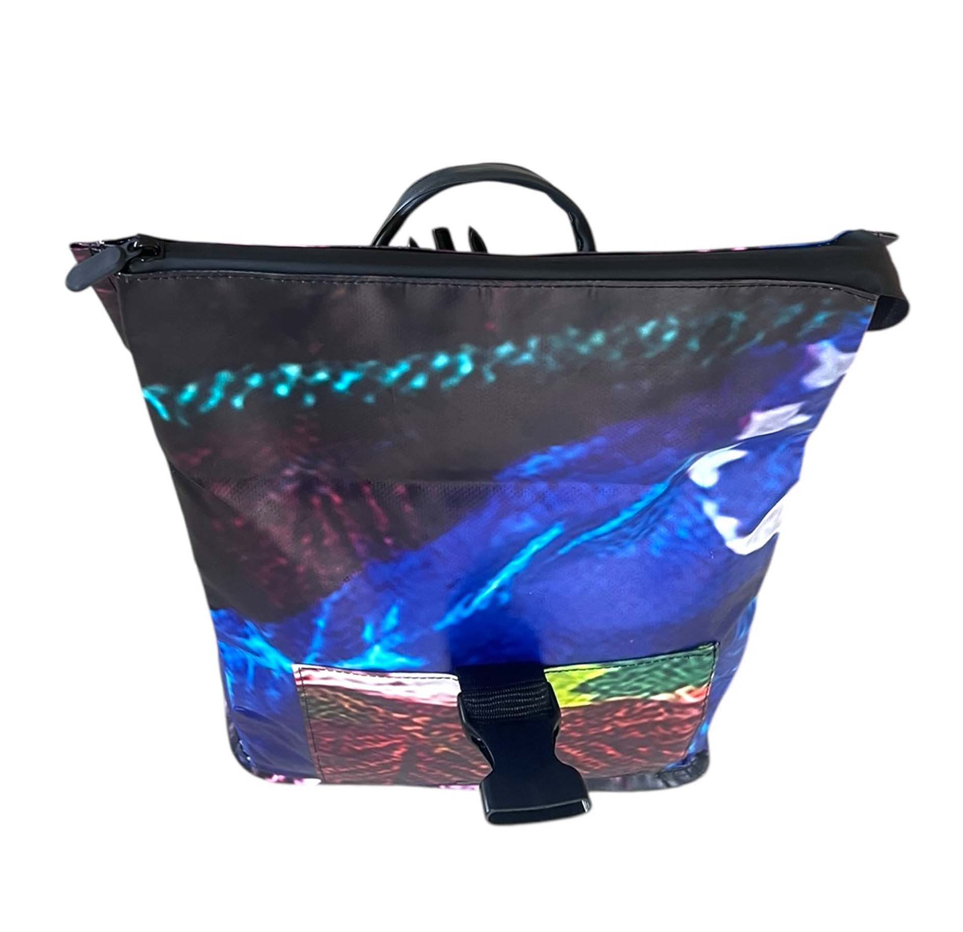 Multicolored bag with a black zipper on a white background