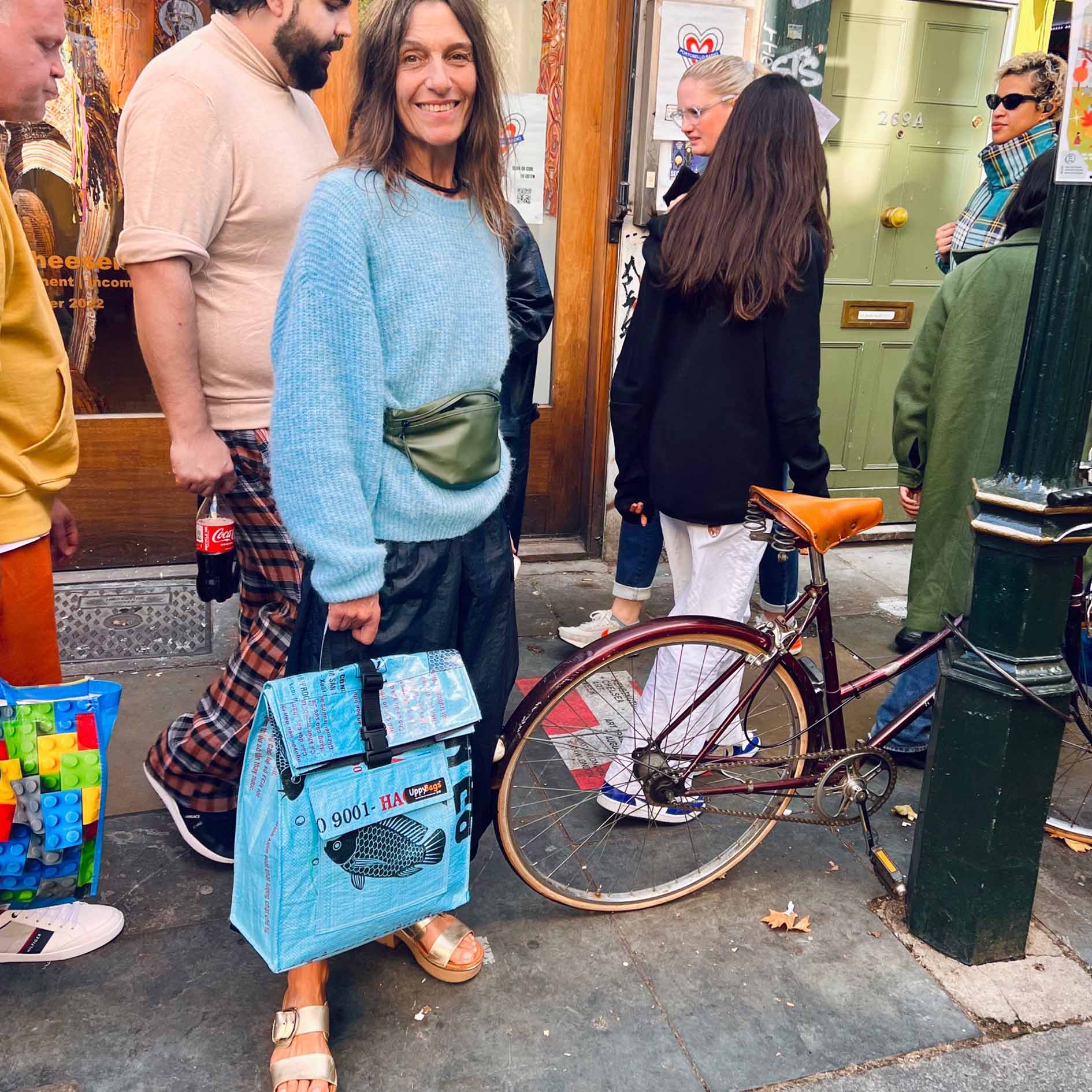 recycled material roll-top backpack with fish print.Animal print bag. Ethically made sustainable rucksack by UppyBags Edit alt text