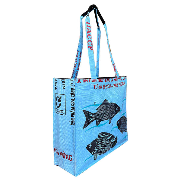 Recycled material blue tote shoulder bag by uppybags, recycled material shoulder bag uk, fish print, blue bag  Edit alt text