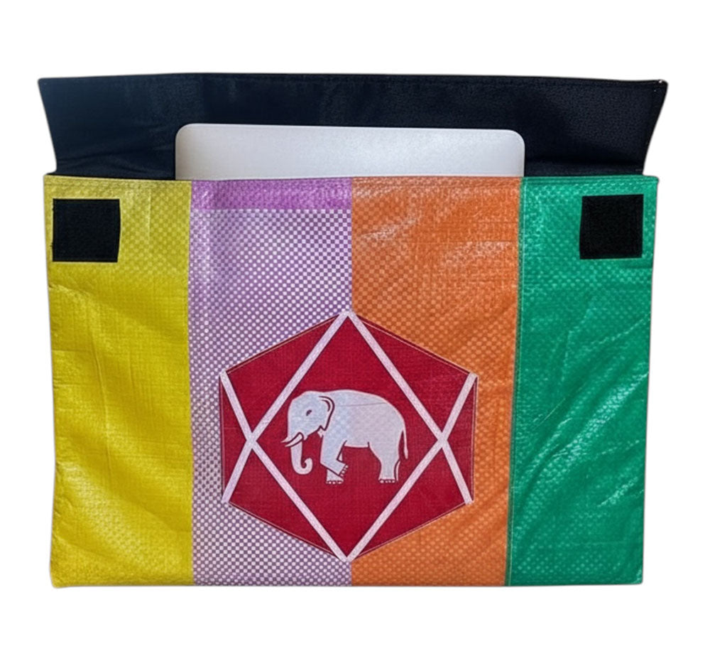 Colorful laptop cover with geometric design and elephant emblem on a white background