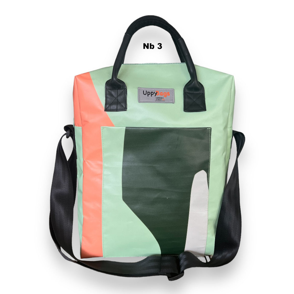  a green Carnaby handbag with a geometric pattern featuring orange and white colors.